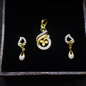 American Diamond studded Pendant set with Earrings for Women.