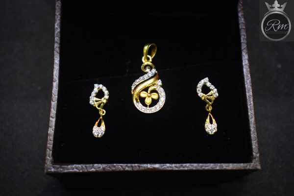 American Diamond studded Pendant set with Earrings for Women.